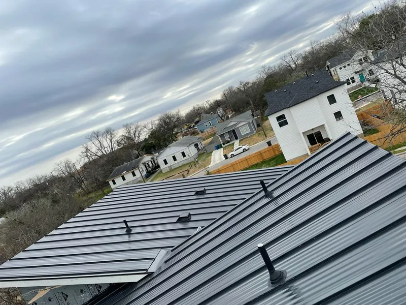 Standing seam metal roof panels with vents for Skylight Repair in Roseville